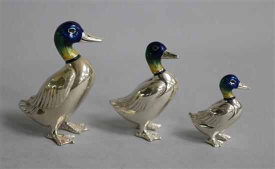 A graduated set of three modern silver and enamel ducks, import marks for Mark Houghton, Ltd, largest 45mm.